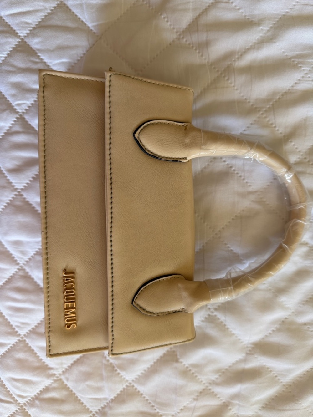 Jacquemus Cream Beige Mini Top-Handle Bag.